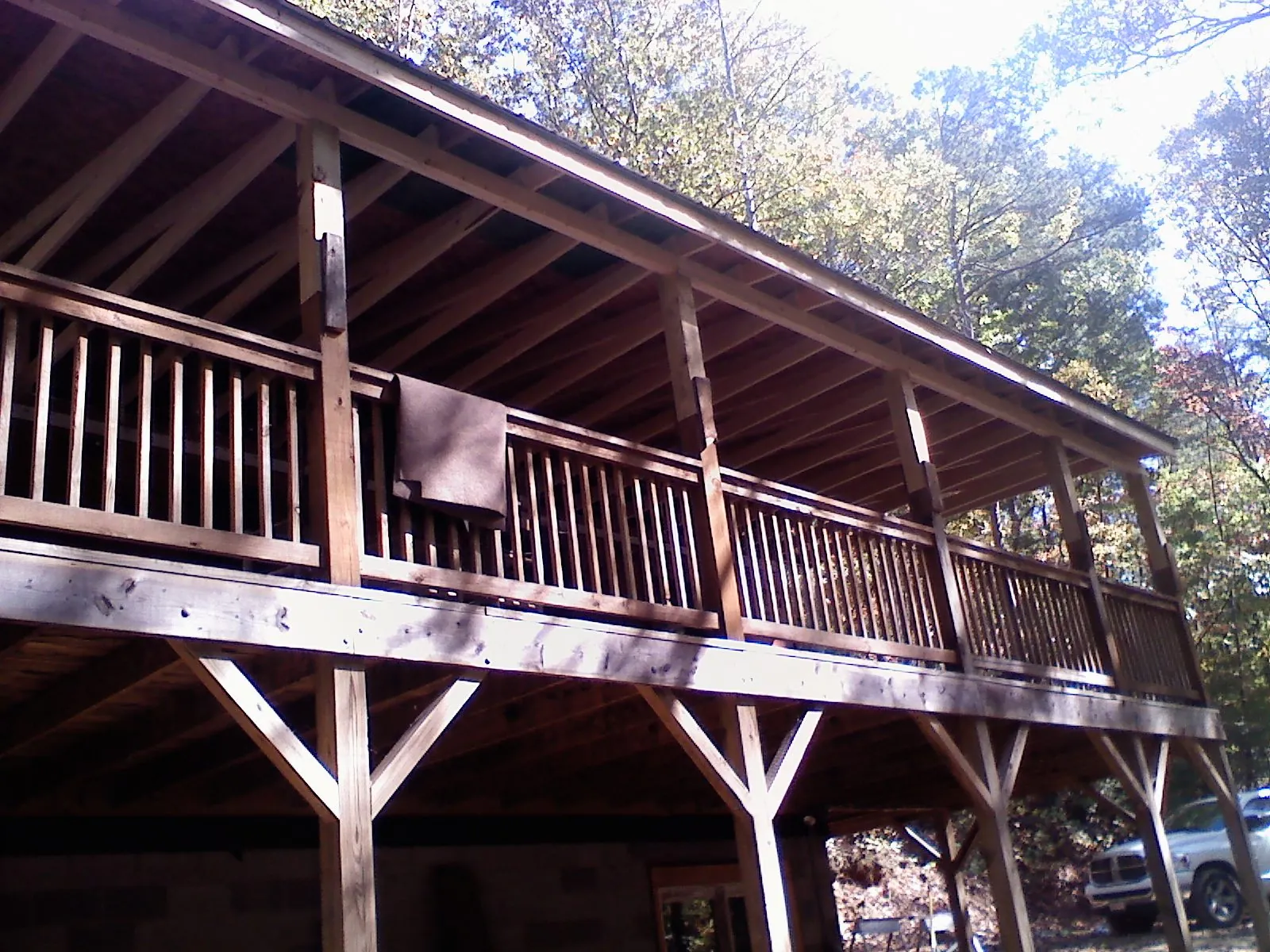 Timber framing under a new elevated porch and deck — Roof Leak Repair in Markleton by Roofing Brothers